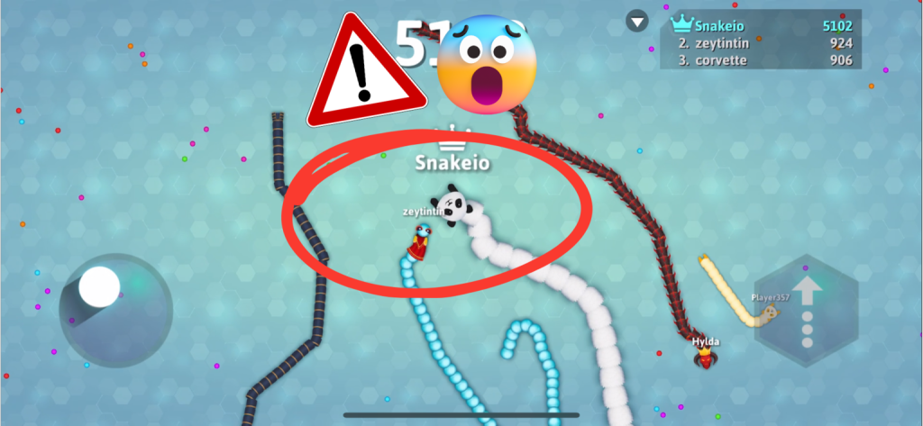 A screenshot of Snake.io, with two snakes about to collide